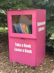 Pink Sidewalk Library. Take a Book Leave a Book