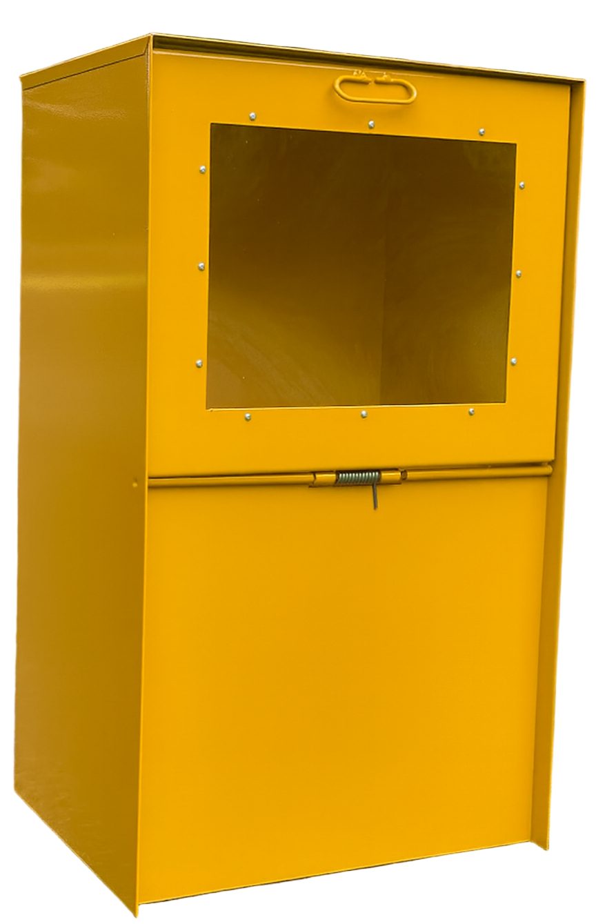 Yellow metal cabinet with a clear front panel on a road with trees in the background